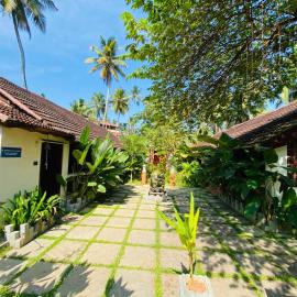 Hotel Holiday Home, hotell i Kovalam