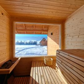 Osada Orlica klimatyczne domki z widokiem na góry i termalnym SPA sauna jacuzzi 4 km od Zieleniec Ski Arena, hotel di Lasowka