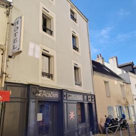 Hôtel l'Acadien โรงแรมในเลอปาเลส์