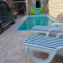 Casa de temporada com piscina