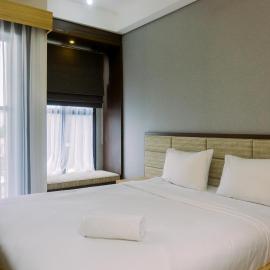 Minimalist and Warm Studio at Transpark Bintaro Apartment By Travelio