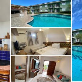 Flat's com 1 quarto, frente praia de Taperapuã, atravessou a rua está na praia, Condomínio Boulevard da Praia conta com piscina, sauna, sala de jogos além de café da manhã como cortesia, hotel in Porto Seguro