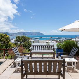 SEIA Dream offers stunning ocean views, sunny living spaces, plunge pool and terraces perfect for relaxing, Walk to Simons Town, Seaforth Beach, Boulders Beach penguins, high speed internet, smart TV and back up solar, ideal for families or remote work