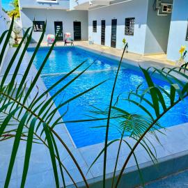 Belgam Lodge โรงแรมในโคโลลิ