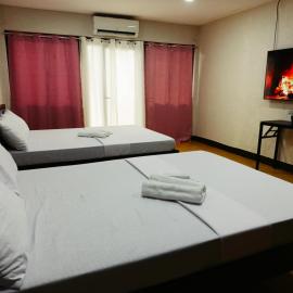 Manalo Resort Hotel, hotel v destinácii Tutulo