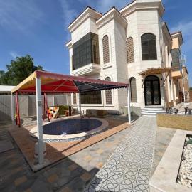 Luxury 6 bedrooms villa with private swimming pool, hotel u gradu Ajman