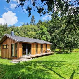 Holzhaus mit Kamin - Am Forellenfluss