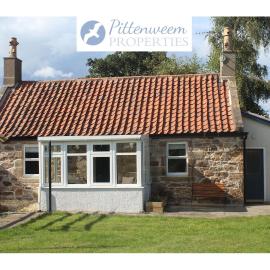 Carpenters Cottage- coastal stay with garden
