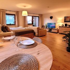 MADISON Homes Apartment 50 qm in Prien mit Balkon, Bergblick, Parkplatz, zentral gelegen