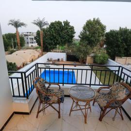 Villa Abo Tarek, hotel in Al Aqālitah