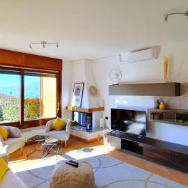 House in Luino with Green Garden and City Views