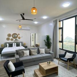 Roghan Hospitality Inn, hotel in Al Ḩamrāʼ