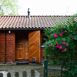 Sfeervol houten huisje met omheinde tuin op de Veluwe