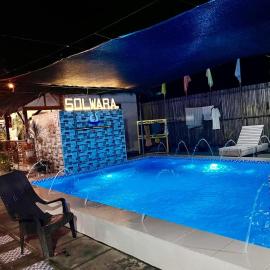 Solwara Beach Resort, отель в городе Sablayan