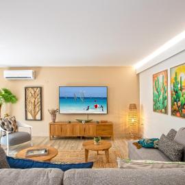 A deux pas de la plage de la BaieOrientale grand appartement avec jardin