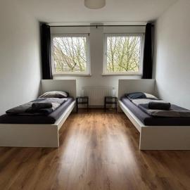 Case Four Boardinghouse mit Parkplatz, Küche, Waschmaschine und Trockner