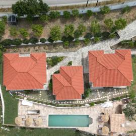 Lorraine's Cottage Style Studios, shared swimming pool and bbq only for guests at Simotata village