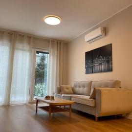 Modern terraced apartment with green garden