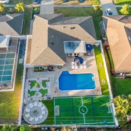 Resort Villa! Heated Pool with Golf plus Firepit and Turf Sports