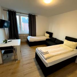 3-Zimmer Monteurwohnung mit Balkon, viešbutis mieste Noimiunsteris
