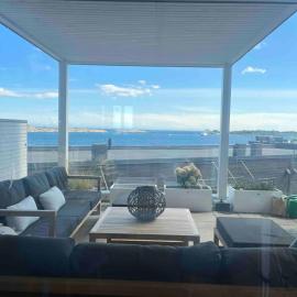 Viesnīca Waterfront apartment pilsētā Rīsēra