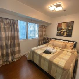 ECN Suite and Staycation by Fort Victoria BGC, хотел в Манила