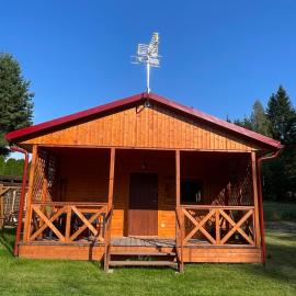 Słoneczne wzgórze domki pod lasem, khách sạn ở Swieszyno