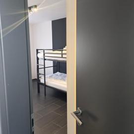 HOSTEL PD23 ALTE FEUERWACHE I 3min CityHospital I 50m Supermarkt I SmartTV I P I Gemeinschaftsküche I Monteure I Kurzurlaub, hotel in Ibbenbüren