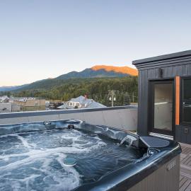 Downtown Loft with Rooftop Hot Tub by StayIn