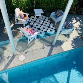 Stanmore Bay lush garden with pool, close to beach