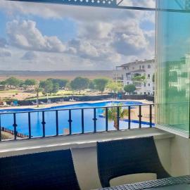 Stunning sunlight apartment with a pool view