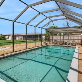 Canal-Front Escape with Private Pool & Game Room in Port Charlotte