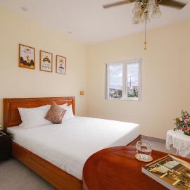 CandlePine Suites - Khách sạn căn hộ