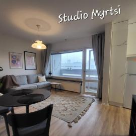 Direct train to Helsinki and airport, near shopping center