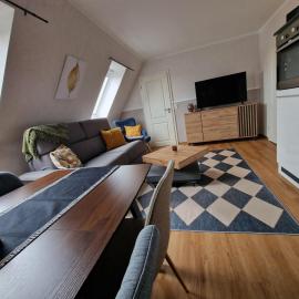 Haus-Fehmarn-am-Dorfteich-|-Wohnung-2-West