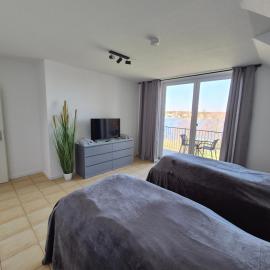 Monteurzimmer 1 mit Seeblick, hotelli kohteessa Zeuthen