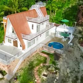 Elmo & Alice Villa Resort، فندق في Ginatilan