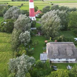 Haus am Leuchtturm ,,Austernfischer Haus " โรงแรมในเพลล์วอร์ม