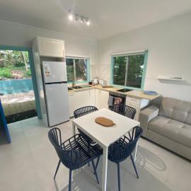 Self contained cozy studio near the beach and boat club