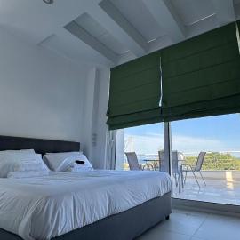 Ambrosia by Dia sea view apartment, hotel in Artemida