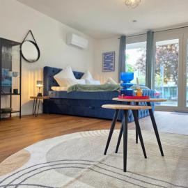 Design I 1-Zimmer-Apartments I Klimaanlage I Boxspring I Parkplatz, hotel in Weil am Rhein