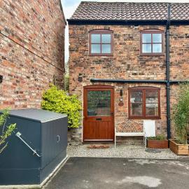 1 Bed cottage town centre free private parking cycle store Boroughbridge، فندق في بوروبريدج