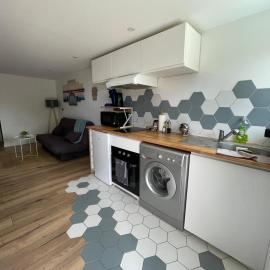 Appartement neuf 1 Chambre en rez de jardin avec