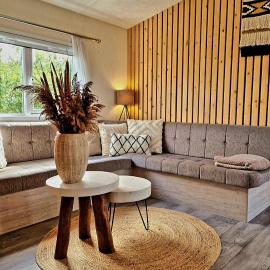 EnJoy Meer und See Ferienhaus -In Lauwersoog- 1-6 Pers- 3 Schlafzimmer, хотел в Лауверсог
