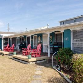 The Sandpiper Hidden Treasure Inn Room by Bryant Real Estate