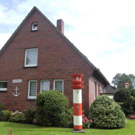 Ferienhaus Zum Leuchtturm, hotel en Burhave