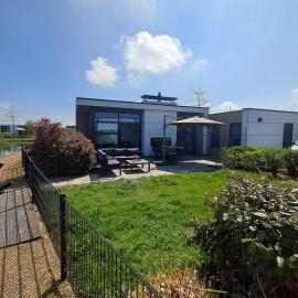 Marina Strandbad Chalet Land in Sicht mit Zaun Haus Nr 81, hotel u gradu Olburgen