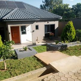Warm Care Executive Apartments, hotel em Mpemba