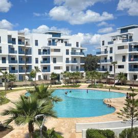 Appartement vue sur piscine à 5 min à pied de la Plage - Résidence Luxe avec Piscines & Parcs Enfants