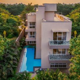 StayVista's Rosso with Outdoor Pool, Theatre-Disc Room & Games Room